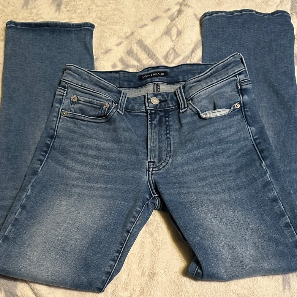 A87.  Lucky Brand Blue Straight Leg Jeans